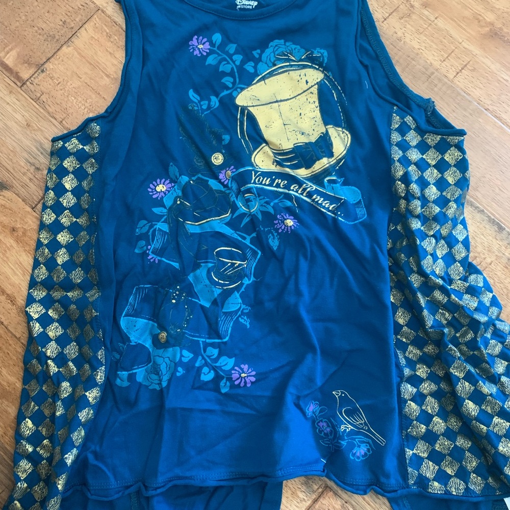 Disney woman’s “we are all mad here” sleeveless. Size M